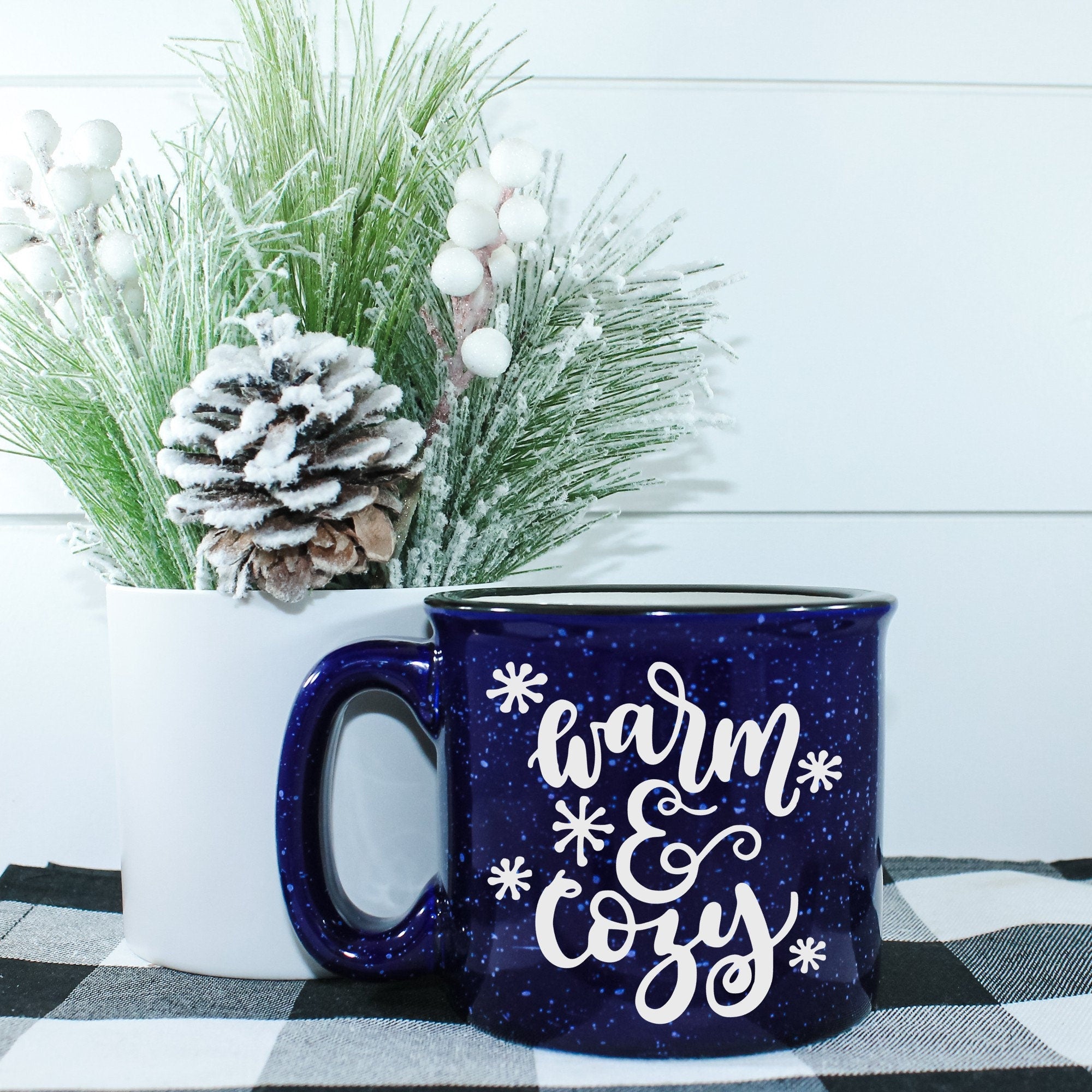 Warm And Cozy Campfire Mug in ceramic with a charming design, perfect for outdoor and indoor use.