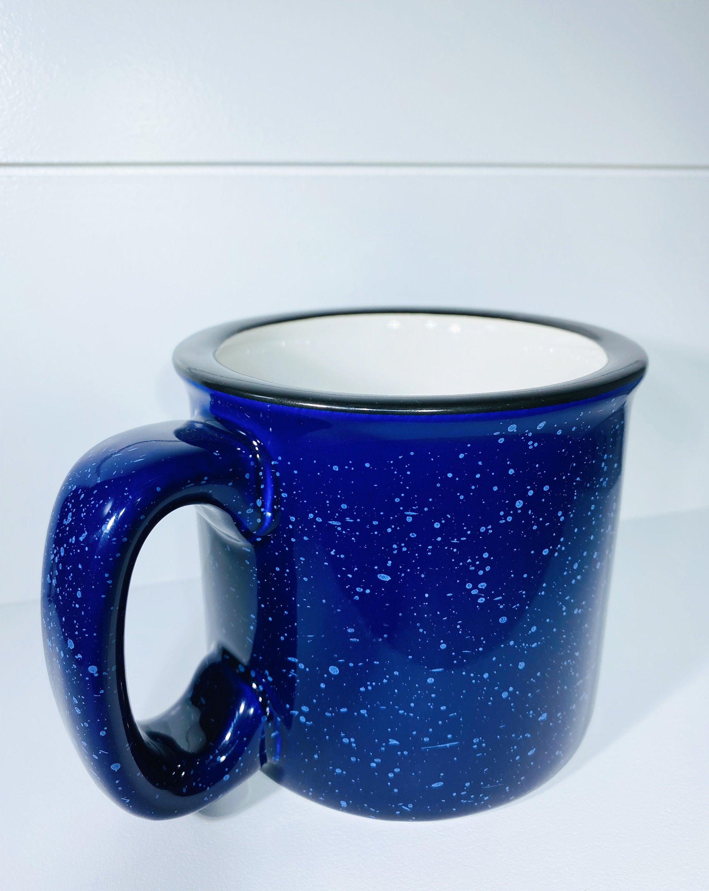 Warm And Cozy Campfire Mug in ceramic with a charming design, perfect for outdoor and indoor use.