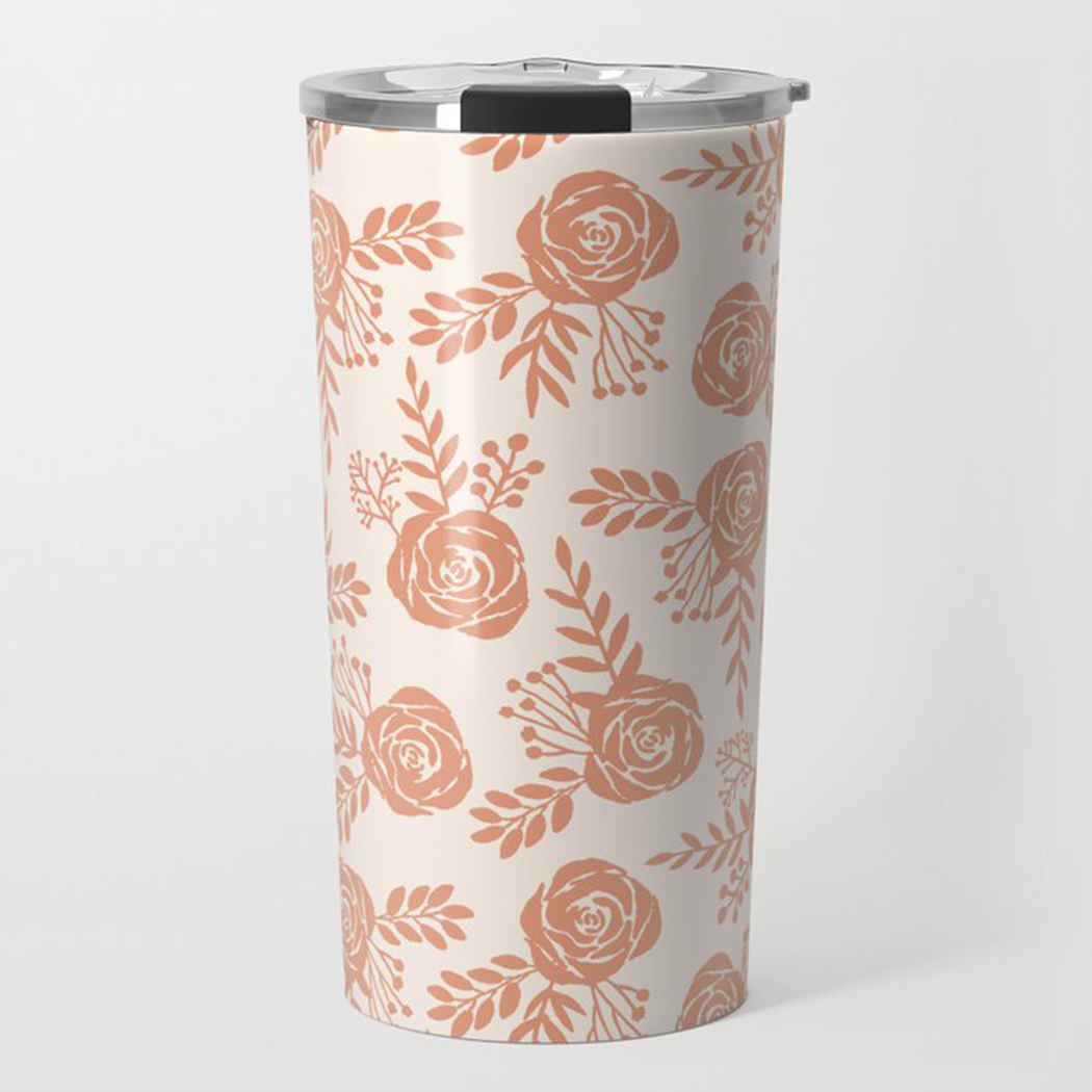 Warm orange floral travel coffee mug made of stainless steel with a double-wall design, featuring a vibrant floral pattern.