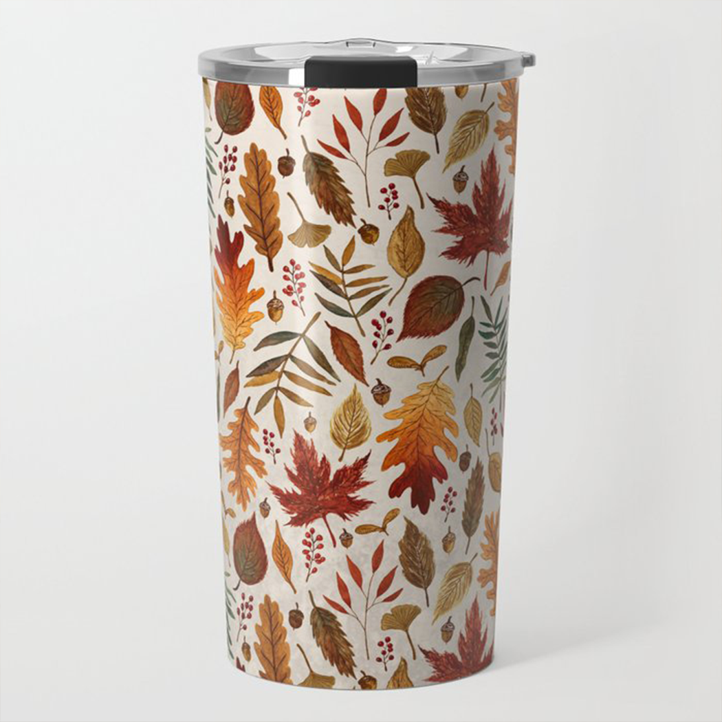 A stylish 20oz travel mug featuring watercolor fall leaves design, made of stainless steel with a vacuum-sealed lid.