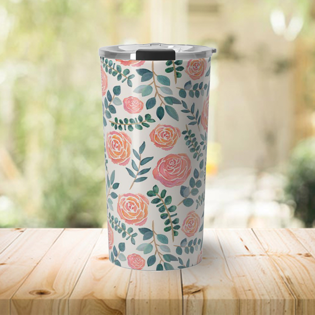 A stylish Watercolor Floral Travel Coffee Mug featuring a vibrant floral design, made of lightweight stainless steel with a vacuum-sealed lid.