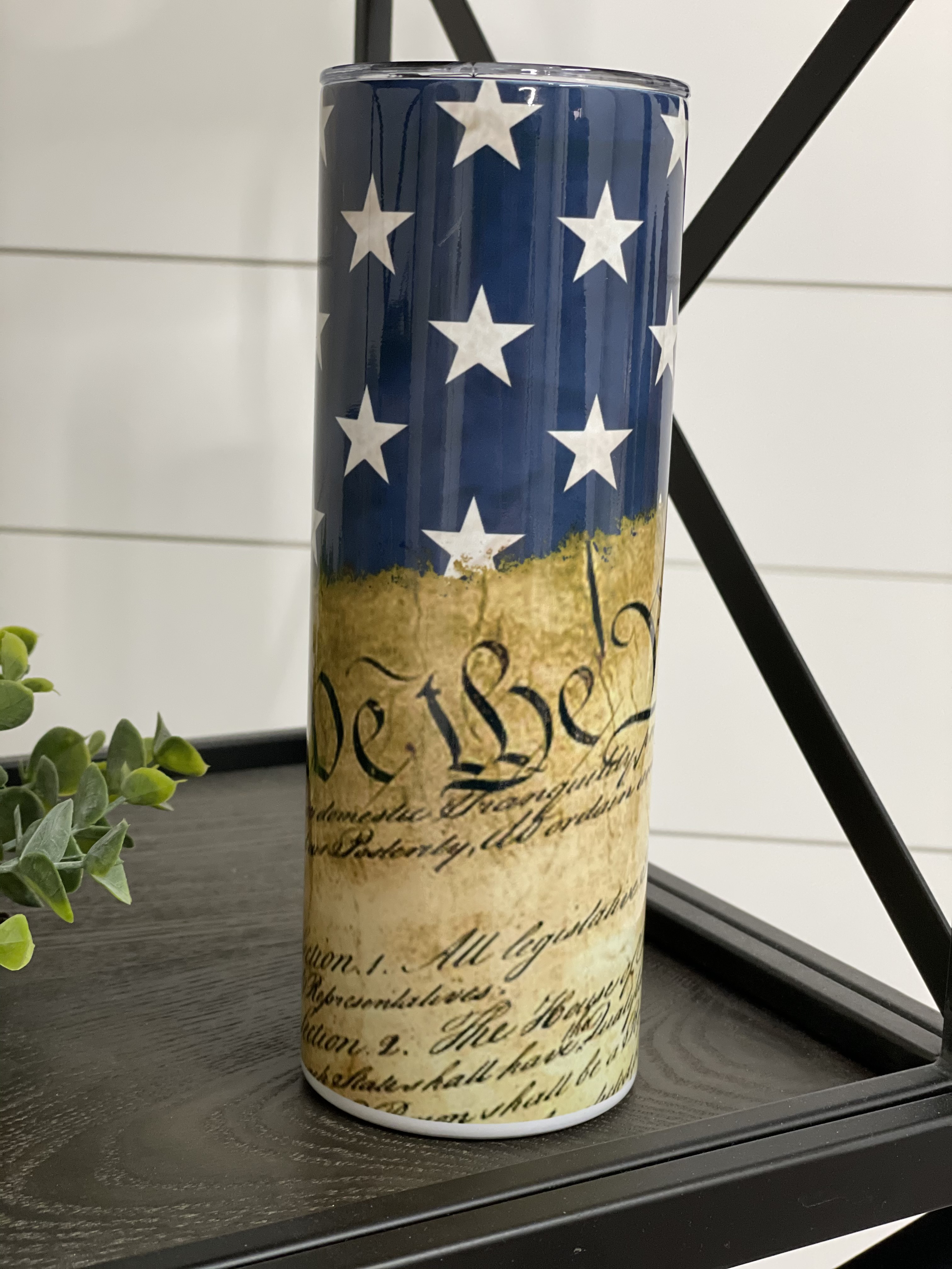 We The People 20oz Skinny Tumbler with a full wrap design, featuring a reusable straw and high-quality finish.