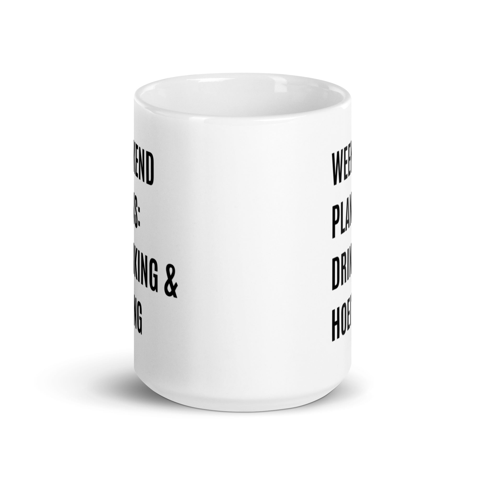 Ceramic mug with a humorous design featuring 'Weekend Plans Drinking & Hoeing', available in two sizes.