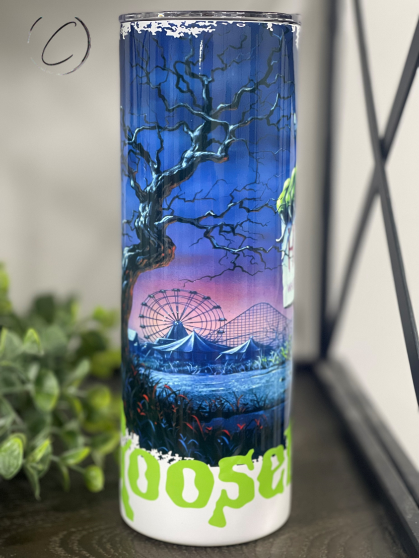 Welcome To Horrorland 20oz Skinny Tumbler featuring a vibrant horror-themed design, perfect for drinks.