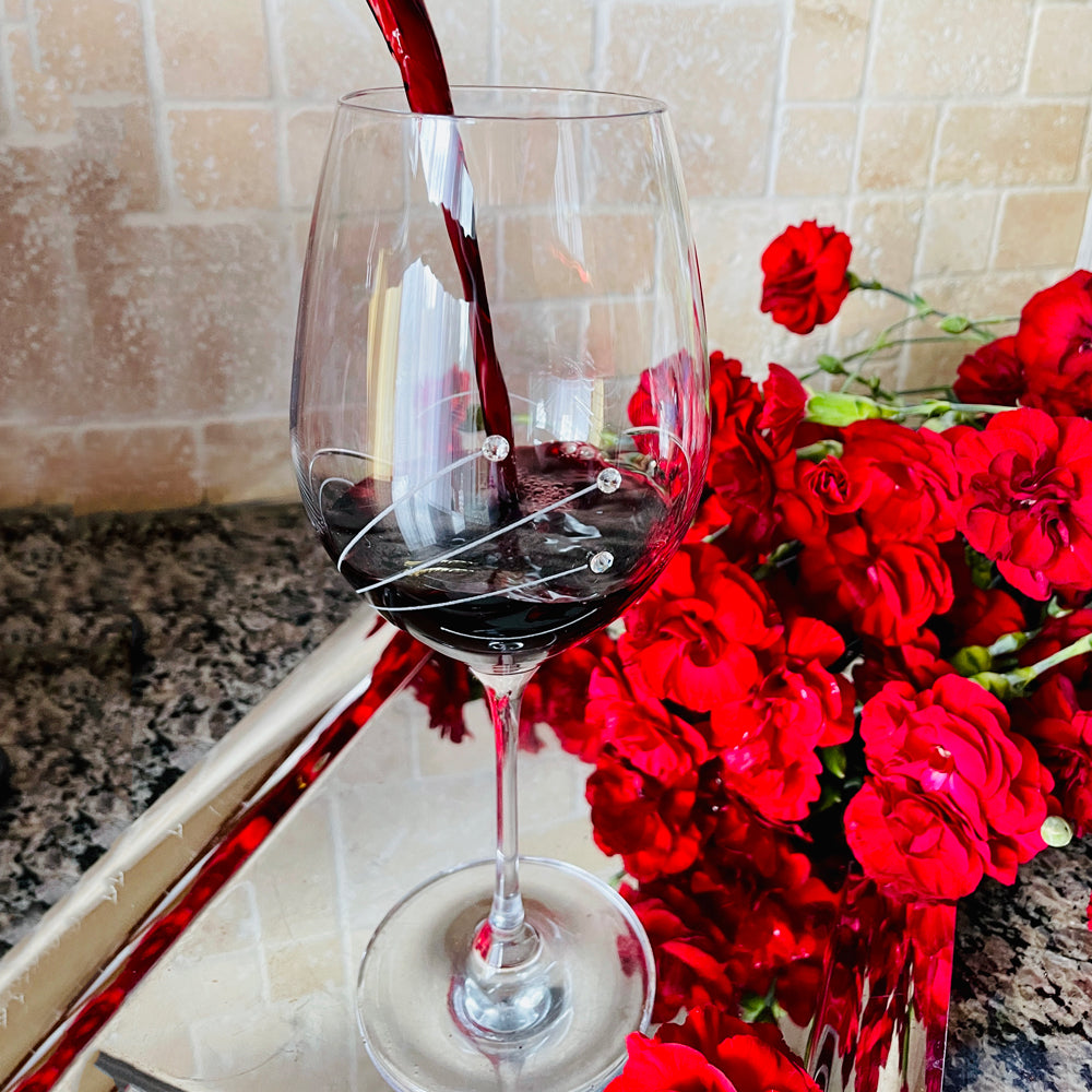 Set of 2 elegant Wine Waves Red Wine Glasses with Swarovski crystals in a gift box, showcasing exquisite hand-cut designs.