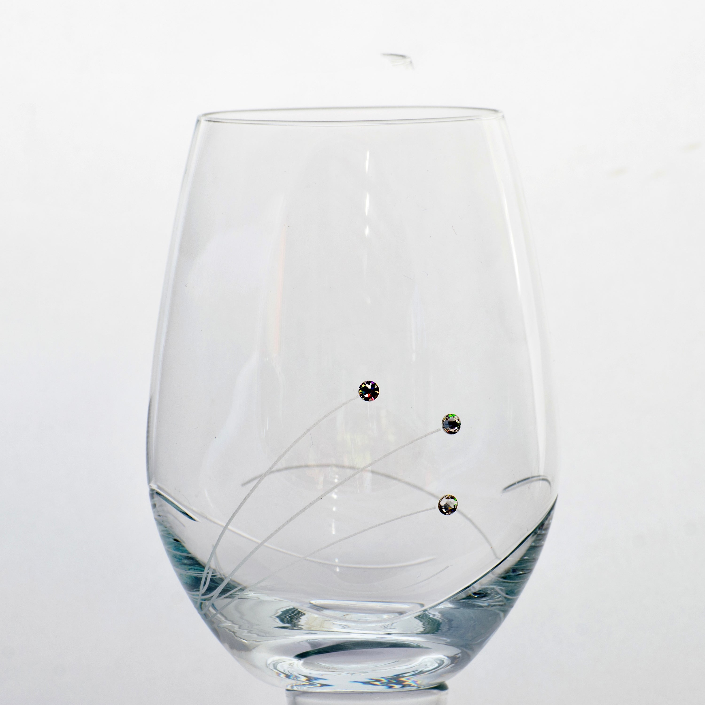 Set of two elegant stemless wine glasses with Swarovski crystals, beautifully crafted from lead-free crystal glass, presented in a gift box.