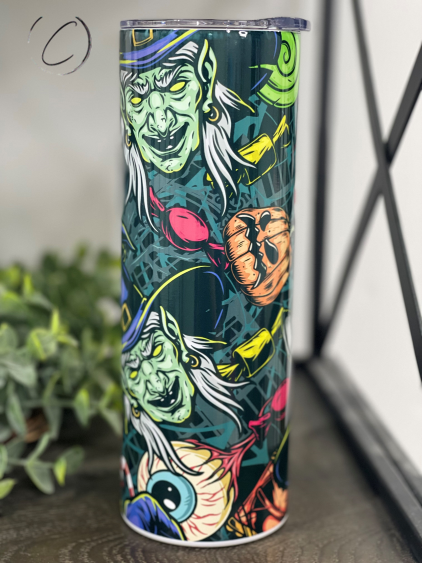 Witches 20oz Skinny Tumbler with a full wrap design, featuring a magical theme, reusable straw, and durable construction.