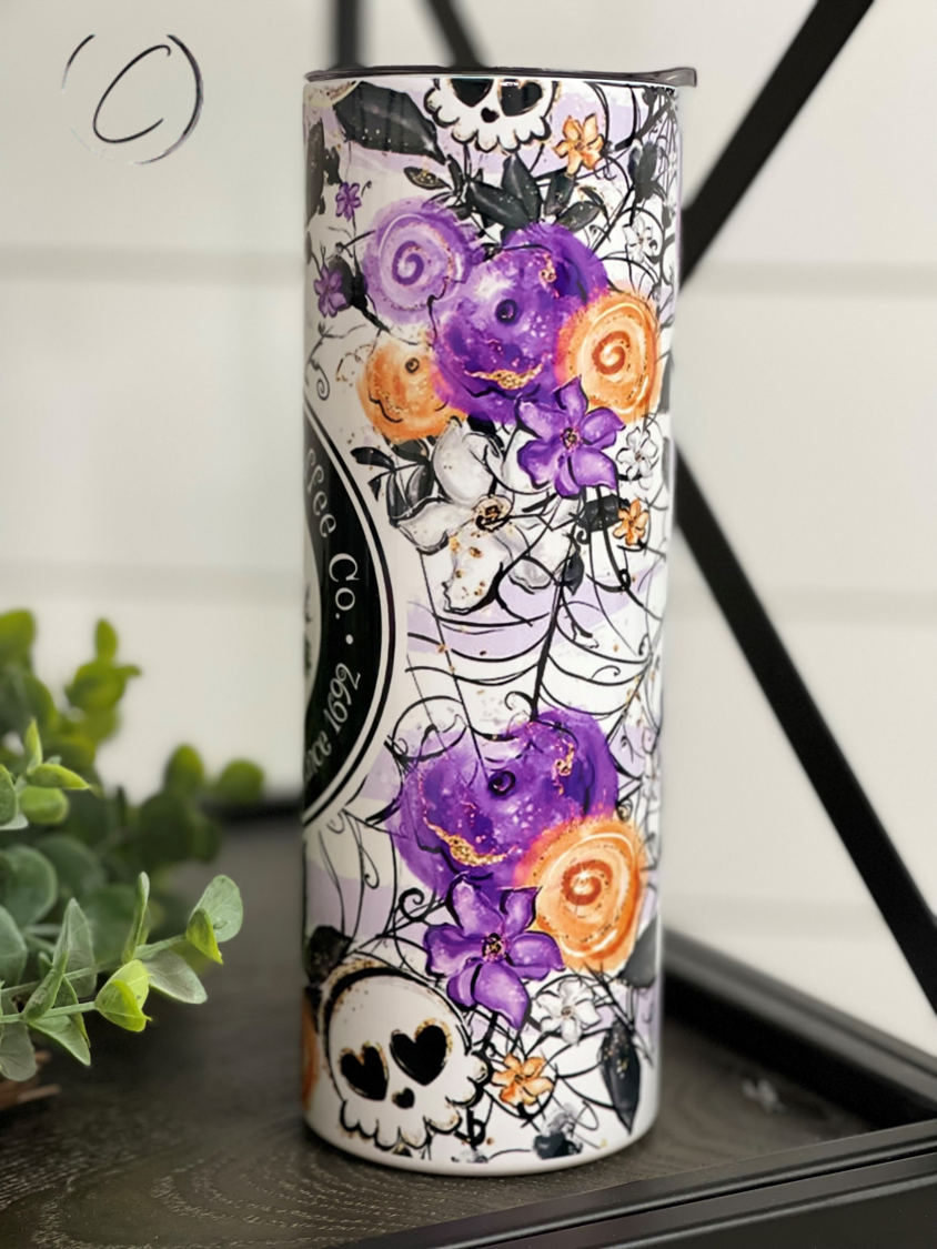 Witches Brew 20oz UV Purple Skinny Tumbler with color-changing effect in sunlight, featuring a unique design and reusable straw.