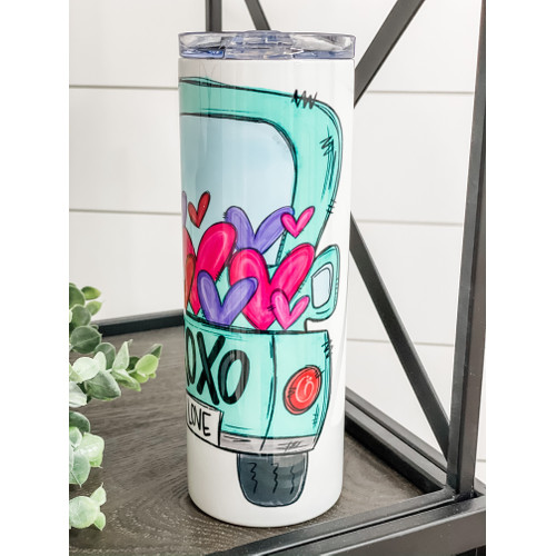 XOXO Truck 20oz Skinny Tumbler with a vibrant design, perfect for hot and cold beverages, includes a reusable straw.