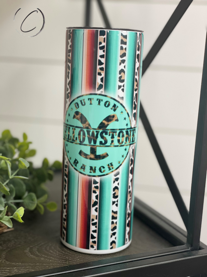 Yellowstone Dutton Ranch 20oz skinny tumbler featuring a full wrap design, durable construction, and a reusable straw.