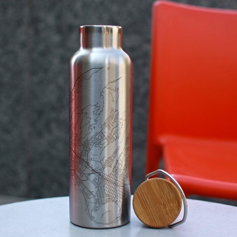 Custom engraved stainless steel bottle featuring a detailed map of Zion National Park with a bamboo top, ideal for outdoor enthusiasts.