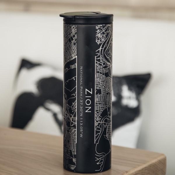 Custom engraved matte black tumbler featuring a detailed map of Zion National Park, Utah, with coordinates.