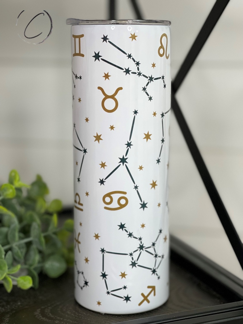 Zodiac 20oz Skinny Tumbler with integrated design, reusable straw, and sleek shape, perfect for hot and cold beverages.