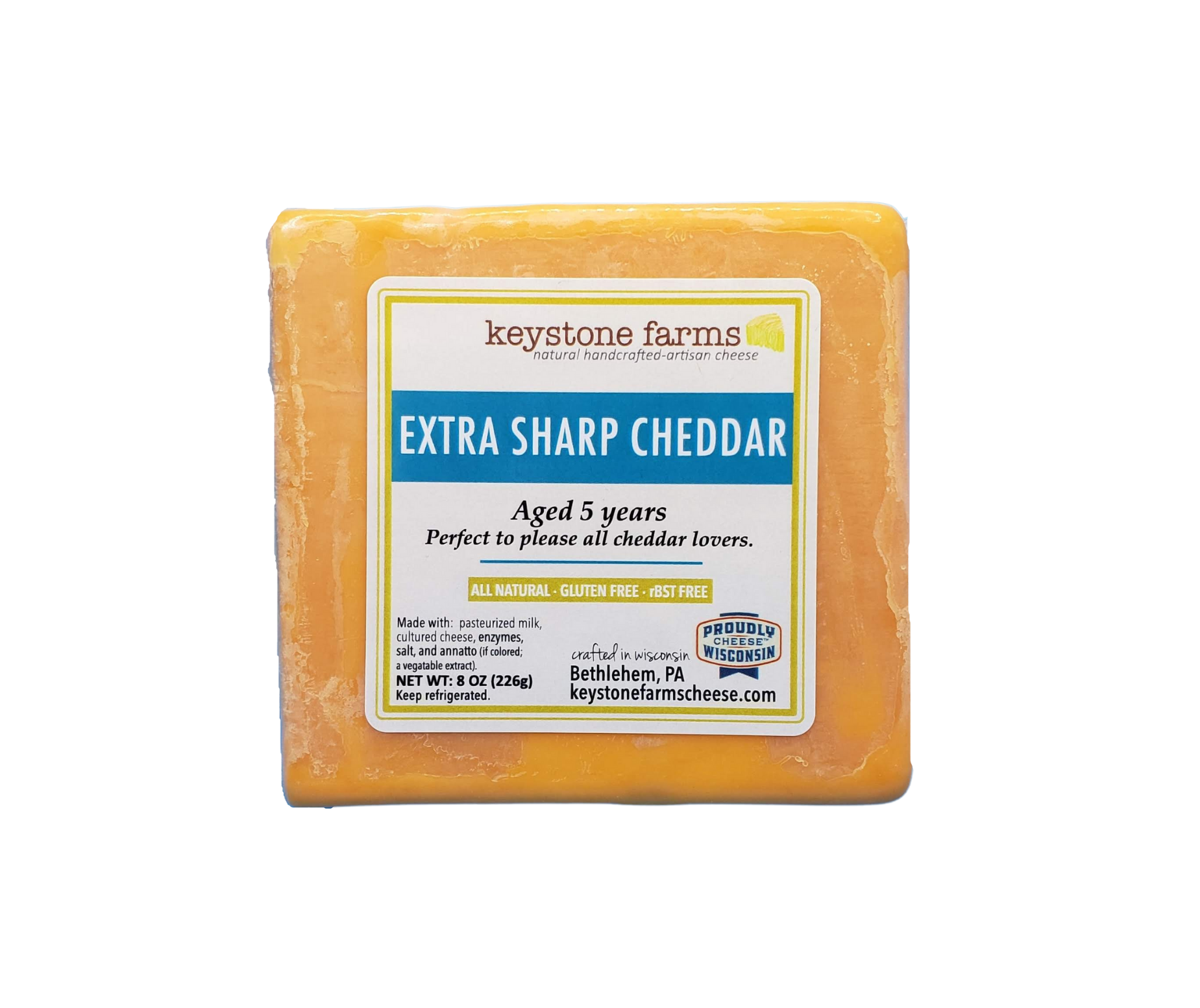 A block of 5 Year Aged White Cheddar cheese, showcasing its rich texture and creamy color, perfect for cheese lovers.