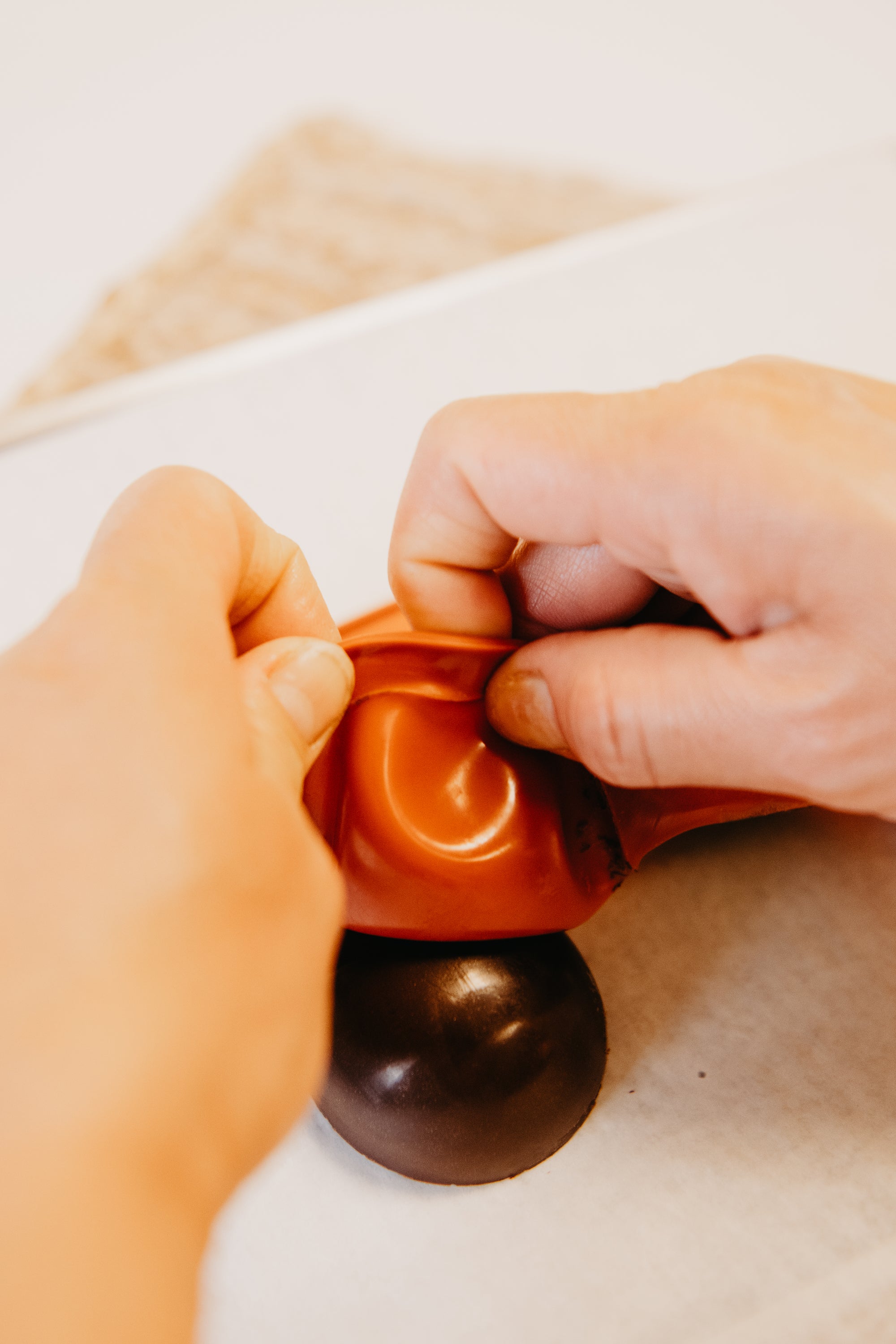 A 6 cavity silicone cocoa bomb mold with chocolate bombs, showcasing its design and functionality for making hot chocolate bombs.