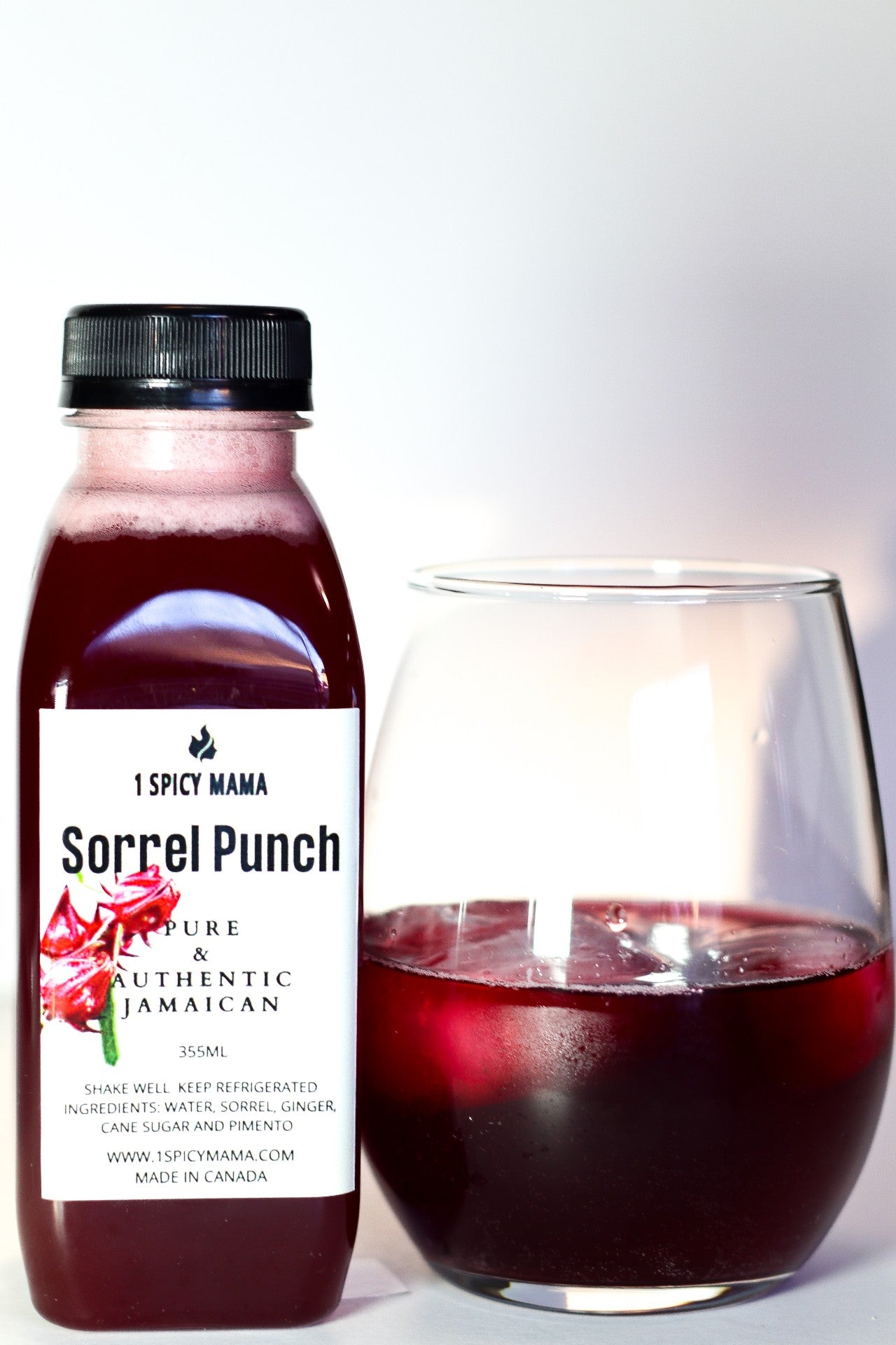 A refreshing 4-pack of all-natural sorrel drink, featuring vibrant red hibiscus color and elegant packaging.