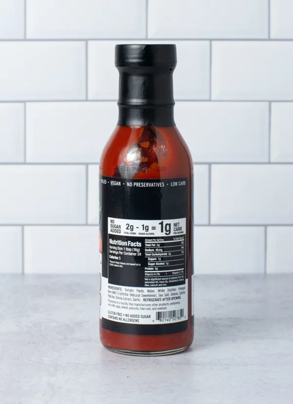 Bottle of AlternaSweets Low Carb Classic Ketchup with a rich, thick consistency, showcasing its label and ingredients.