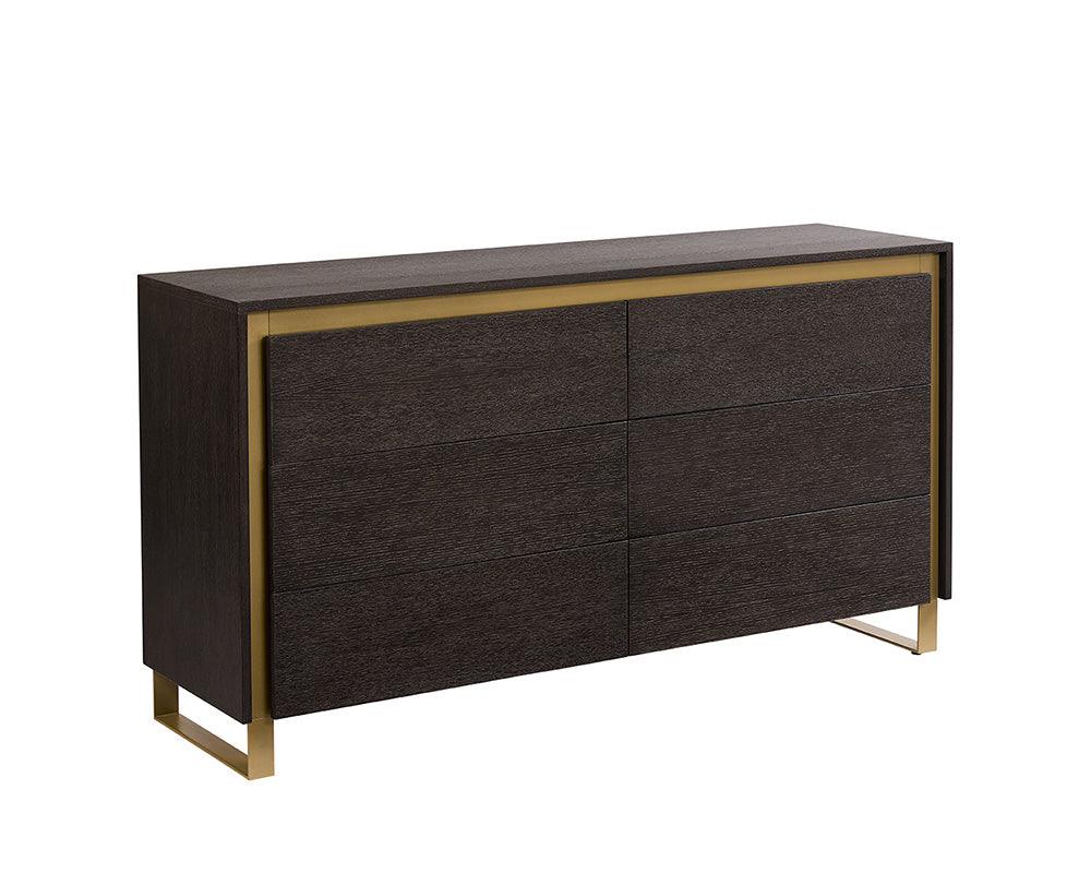 Alvaro Dresser featuring a grey finish, solid oak wood, and rustic bronze steel legs, showcasing its elegant design and spacious drawers.