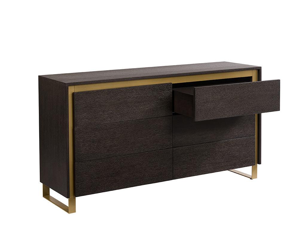 Alvaro Dresser featuring a grey finish, solid oak wood, and rustic bronze steel legs, showcasing its elegant design and spacious drawers.