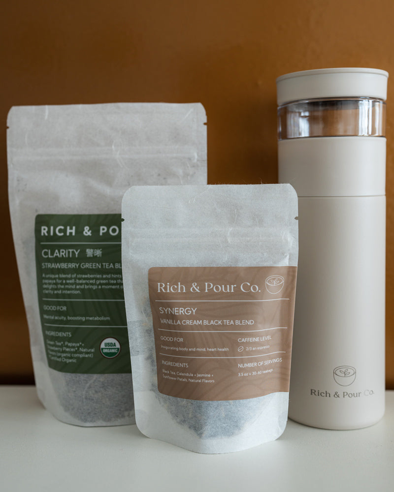 Always on the Go Set featuring strawberry green tea, vanilla cream black tea, and a stainless steel infuser tumbler.