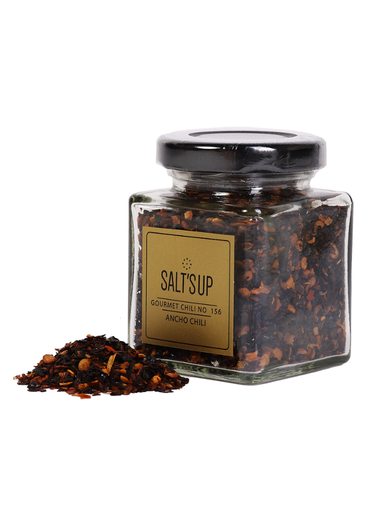 A jar of Ancho Chili showcasing its rich, dark red color and dried texture, perfect for enhancing Mexican dishes.