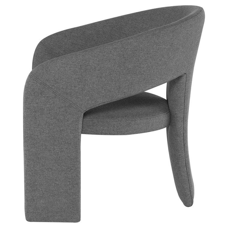 Anise Occasional Chair in shale grey with a unique three-legged design and plush fabric, showcasing its elegant curves.