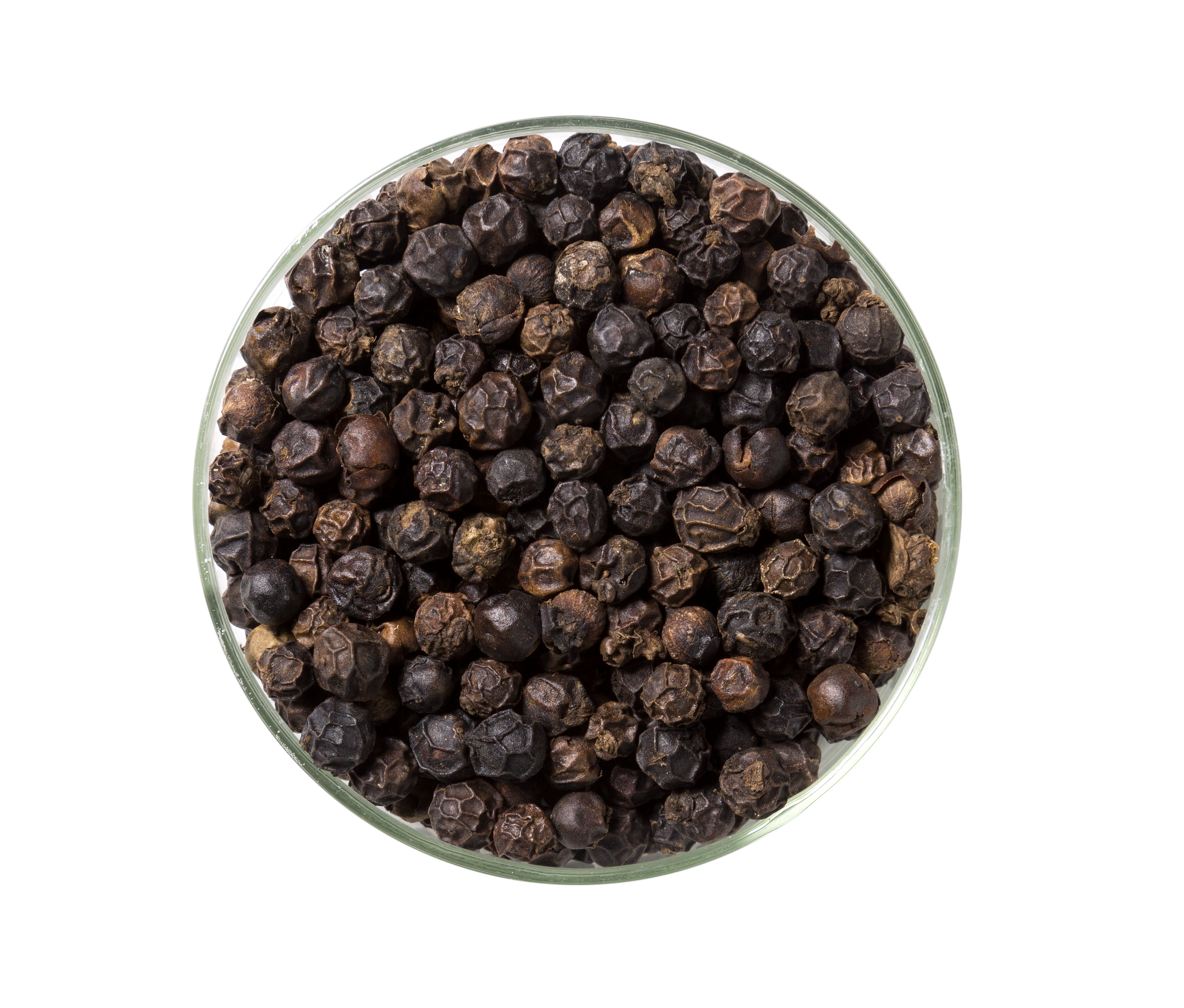 A glass jar containing Banasura Highland pepper, showcasing its rich, dark berries and elegant packaging.