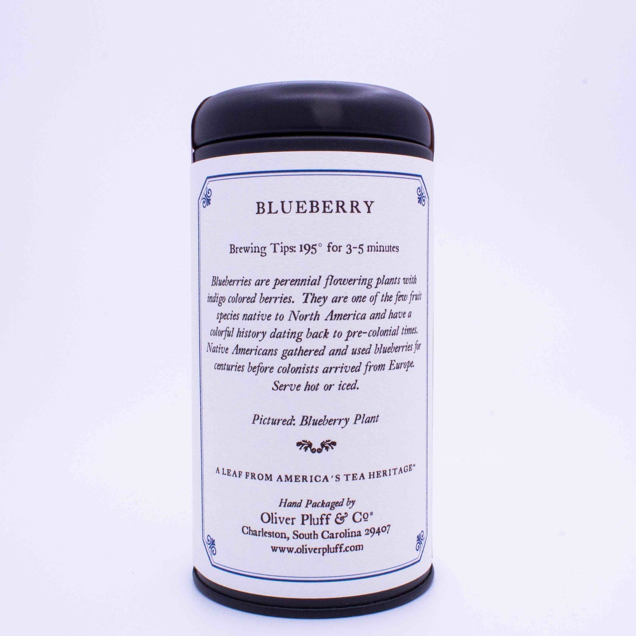 A stylish matte black tin containing Blueberry Loose Tea, showcasing the vibrant colors of the tea leaves and blueberries.