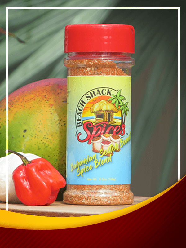 A jar of Bohemian Scotch Bonnet Spice Blend showcasing vibrant spices with a tropical theme, perfect for enhancing meals.