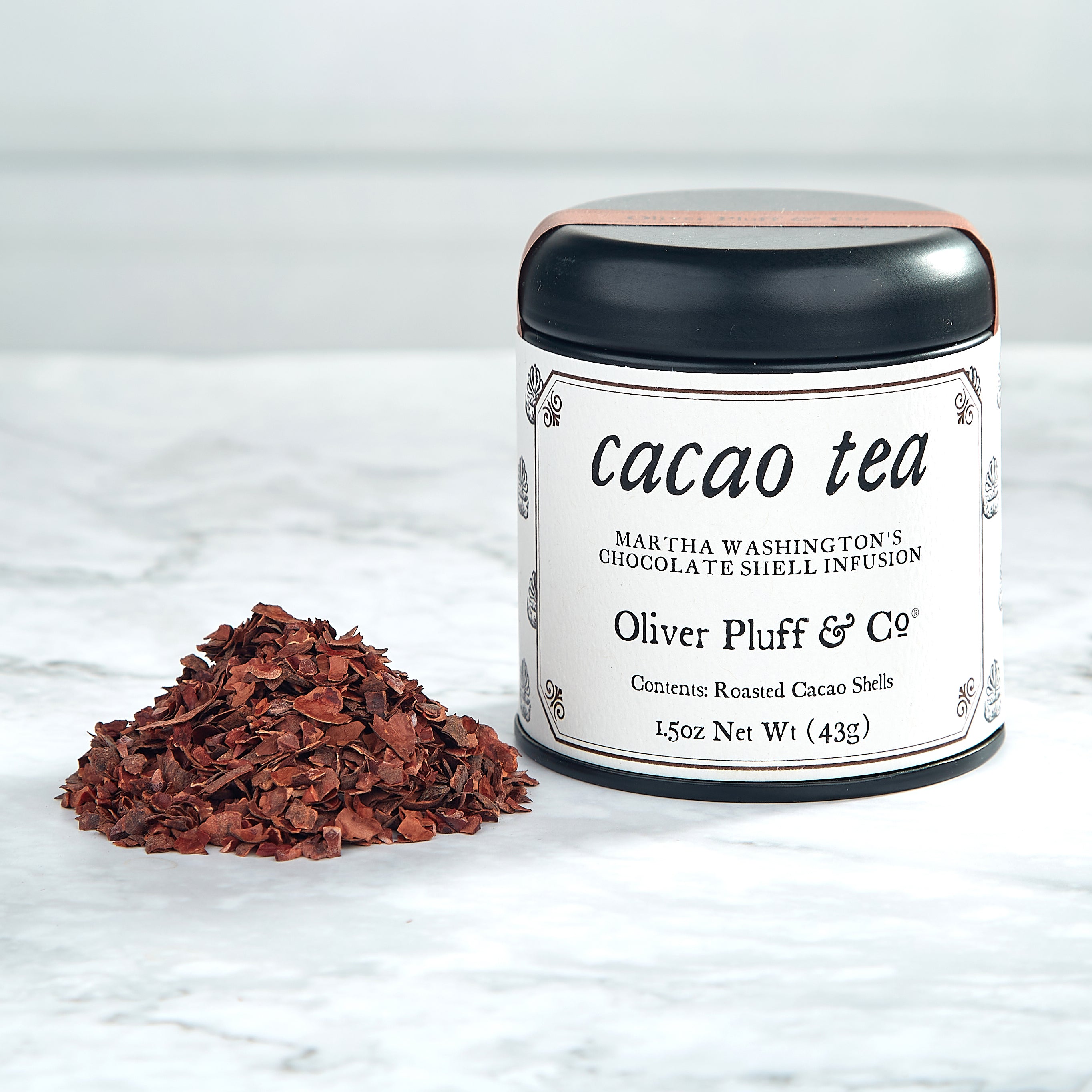 Cacao Shell Quartet featuring four tins of cacao shell tea blends: Cacao Mint, Cacao Citrus, Cacao Cinnamon, and Cacao Shell Tea.