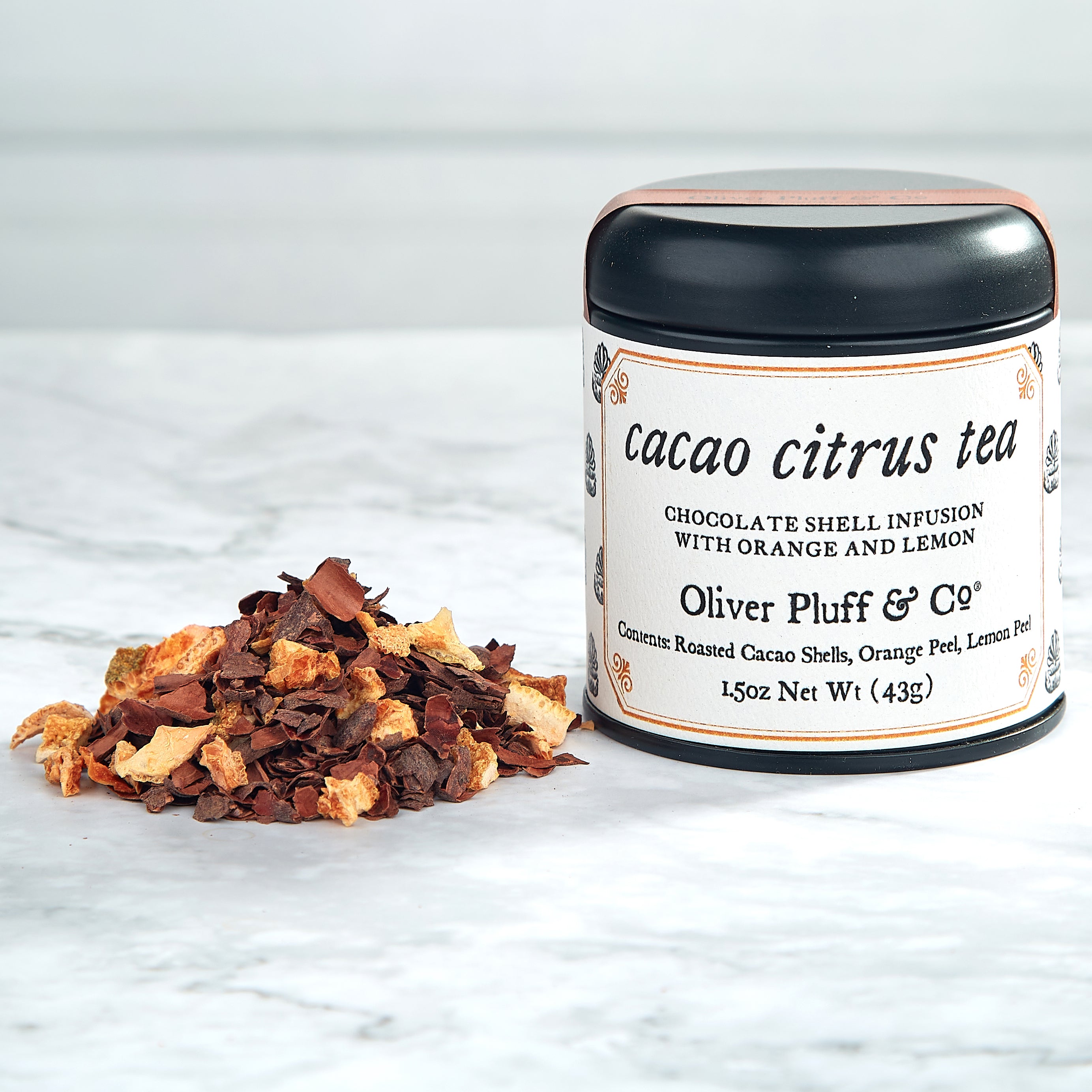 Cacao Shell Quartet featuring four tins of cacao shell tea blends: Cacao Mint, Cacao Citrus, Cacao Cinnamon, and Cacao Shell Tea.