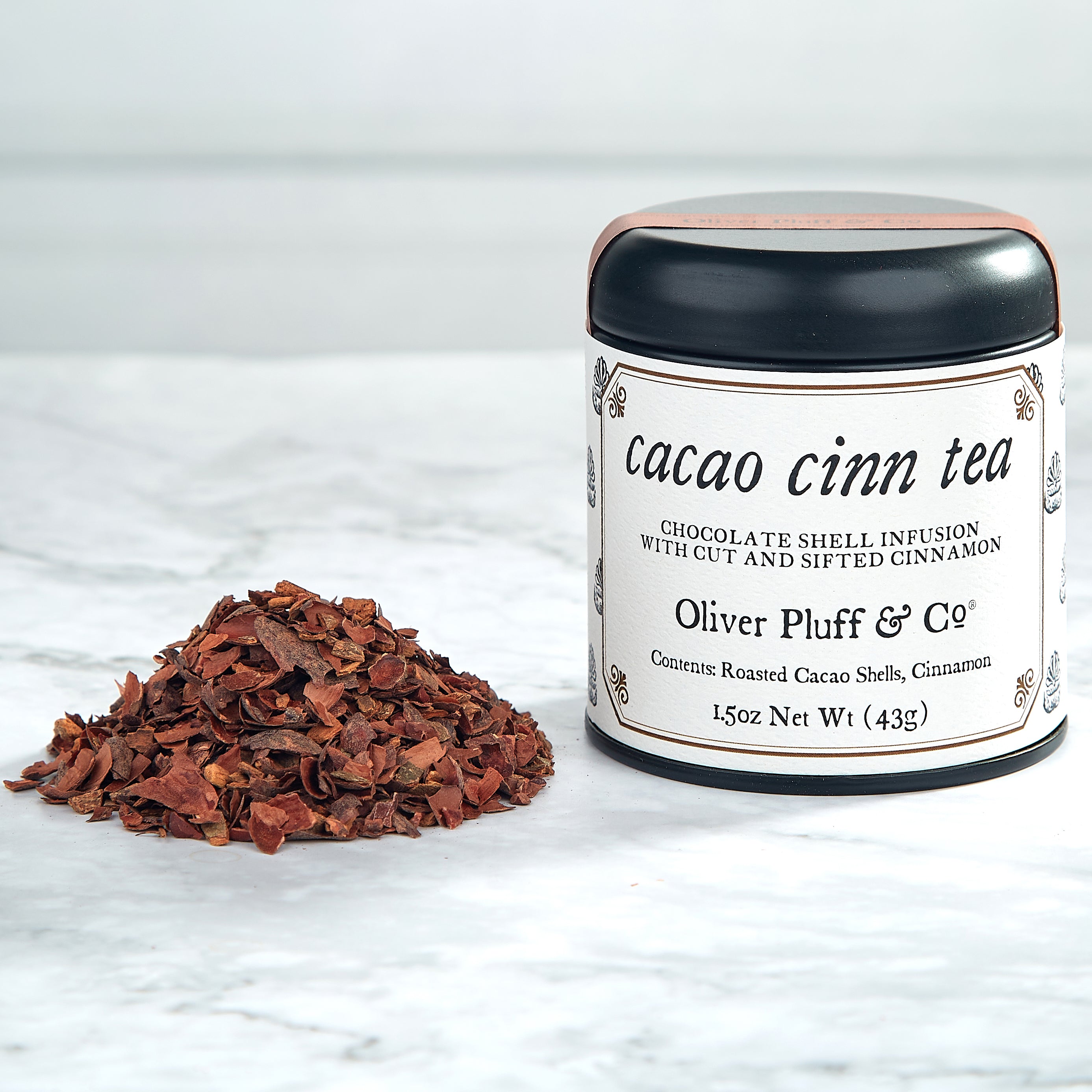 Cacao Shell Quartet featuring four tins of cacao shell tea blends: Cacao Mint, Cacao Citrus, Cacao Cinnamon, and Cacao Shell Tea.