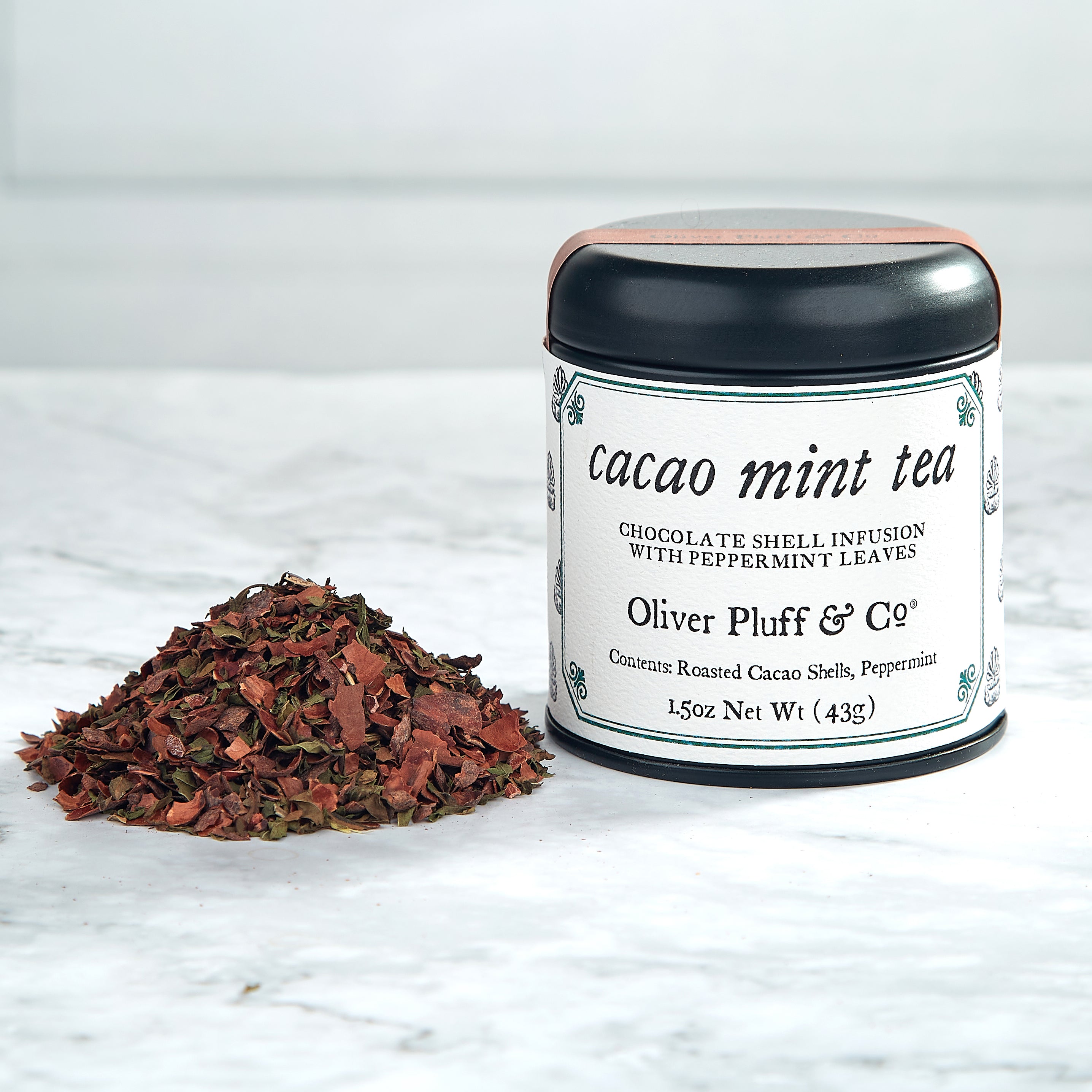 Cacao Shell Quartet featuring four tins of cacao shell tea blends: Cacao Mint, Cacao Citrus, Cacao Cinnamon, and Cacao Shell Tea.