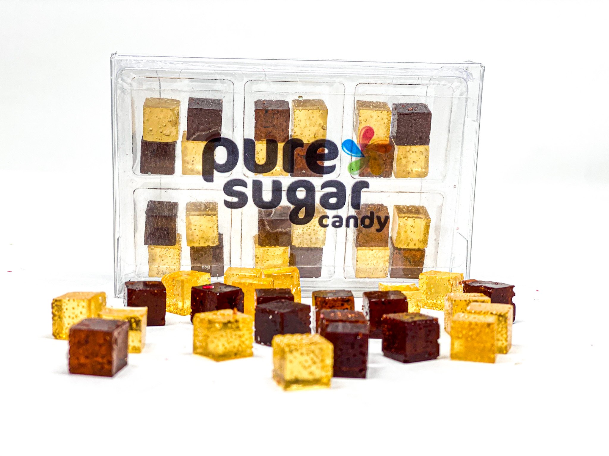 A tray of Candy Cubes featuring Boston Cream Pie flavor, showcasing chocolate and Bavarian cream cubes in a colorful presentation.