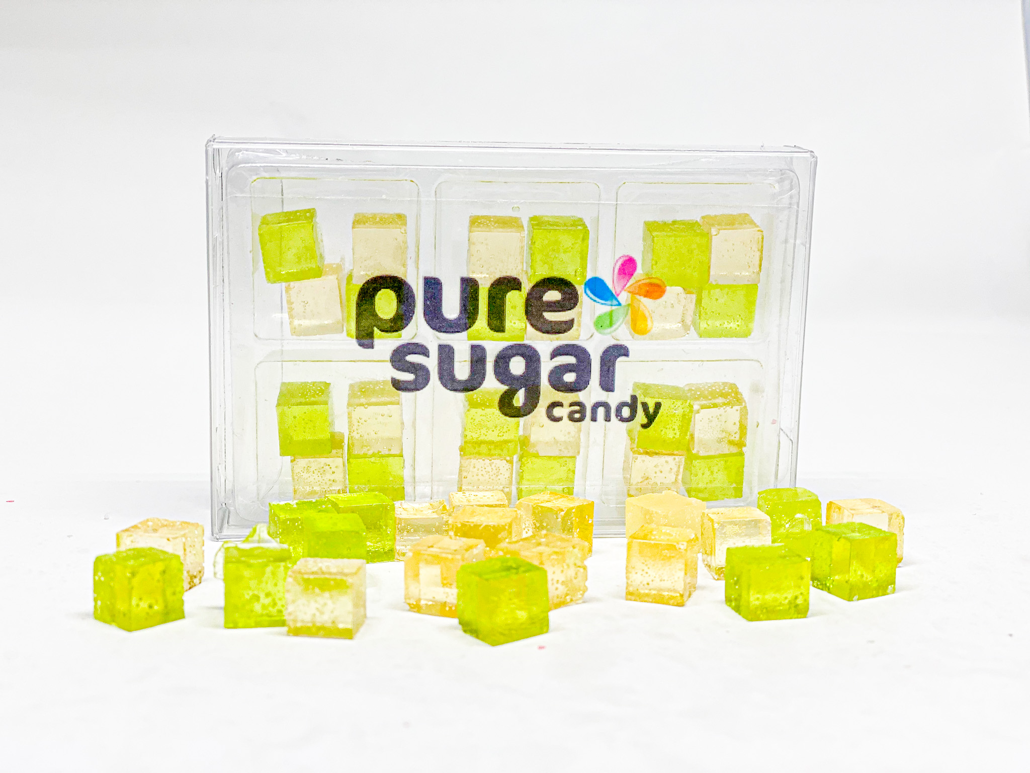 A vibrant tray of Key Lime Pie Candy Cubes, showcasing their bright green color and unique cube shape, perfect for a sweet treat.