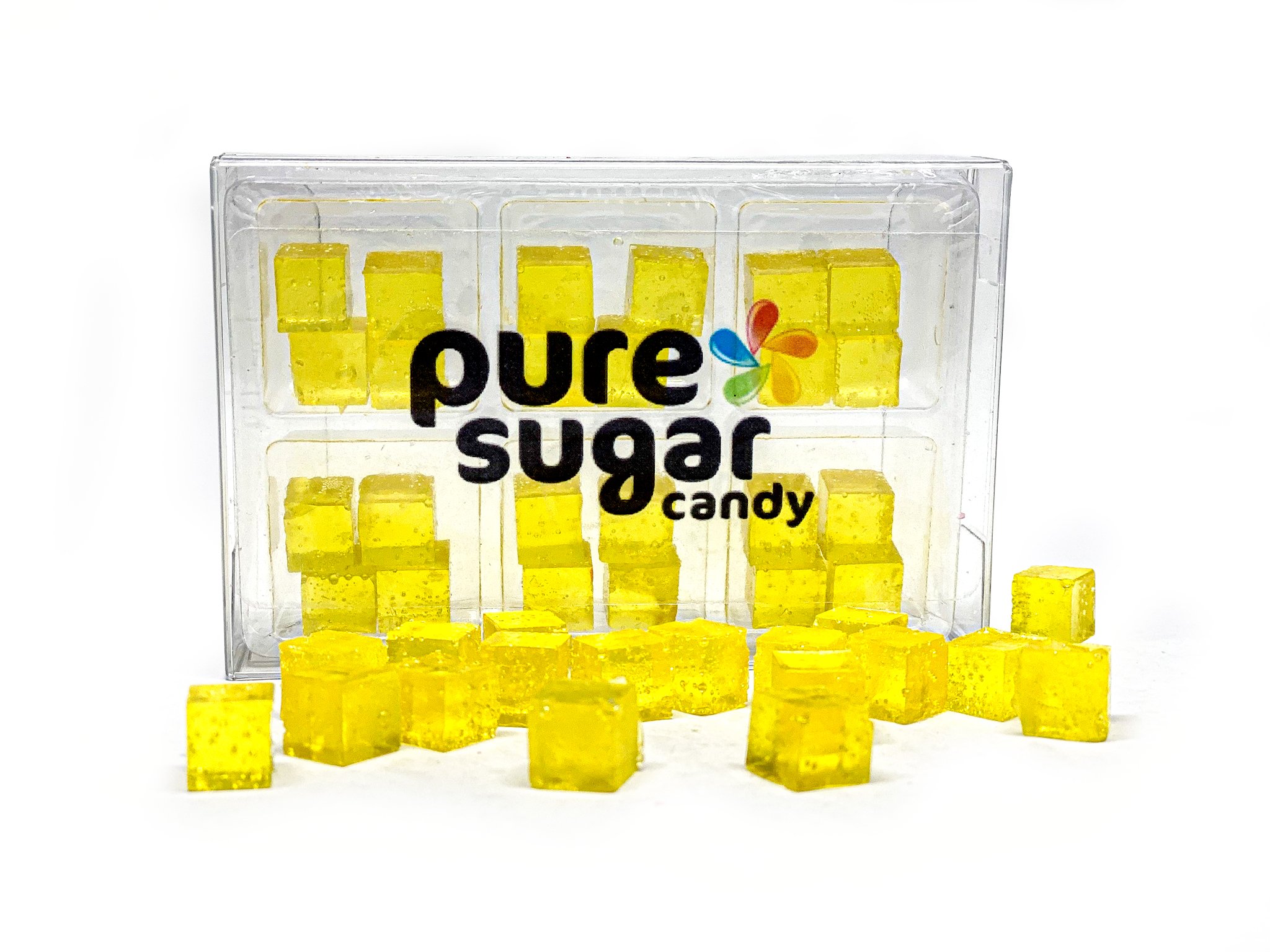 A vibrant tray of Candy Cubes in Lemon Drop Martini flavor, showcasing their bright yellow color and cube shape.