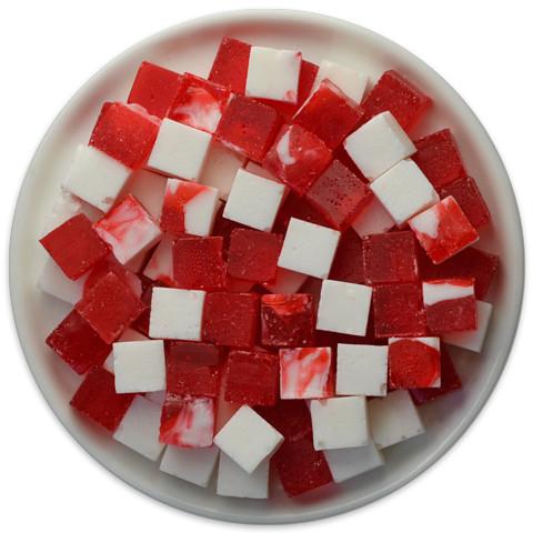 A tray of Candy Cubes - Peppermint featuring vibrant green and white cubes, showcasing their refreshing peppermint flavor.