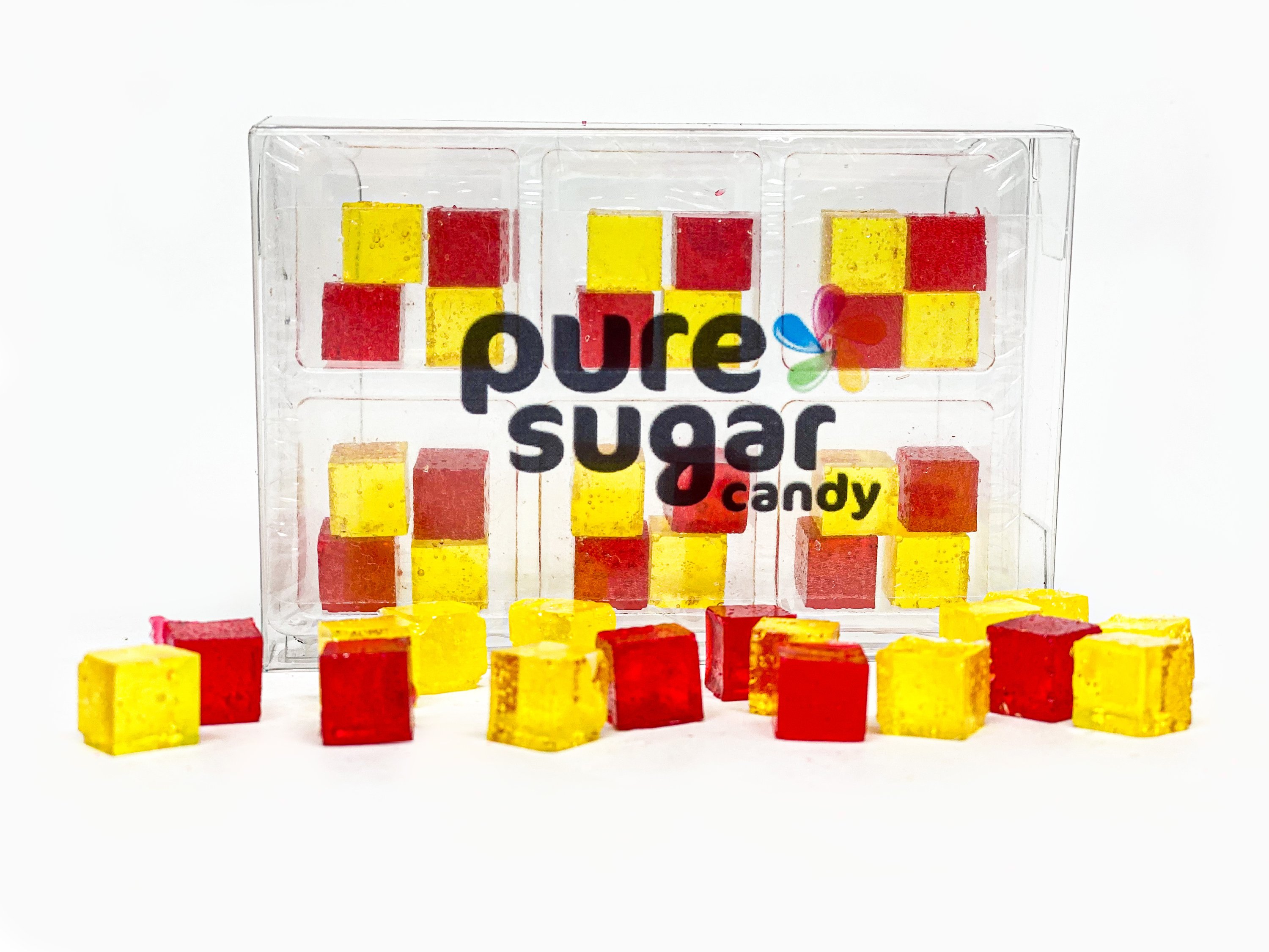 A colorful tray of Candy Cubes in Raspberry Lemonade flavor, showcasing vibrant cubes in a variety of colors.