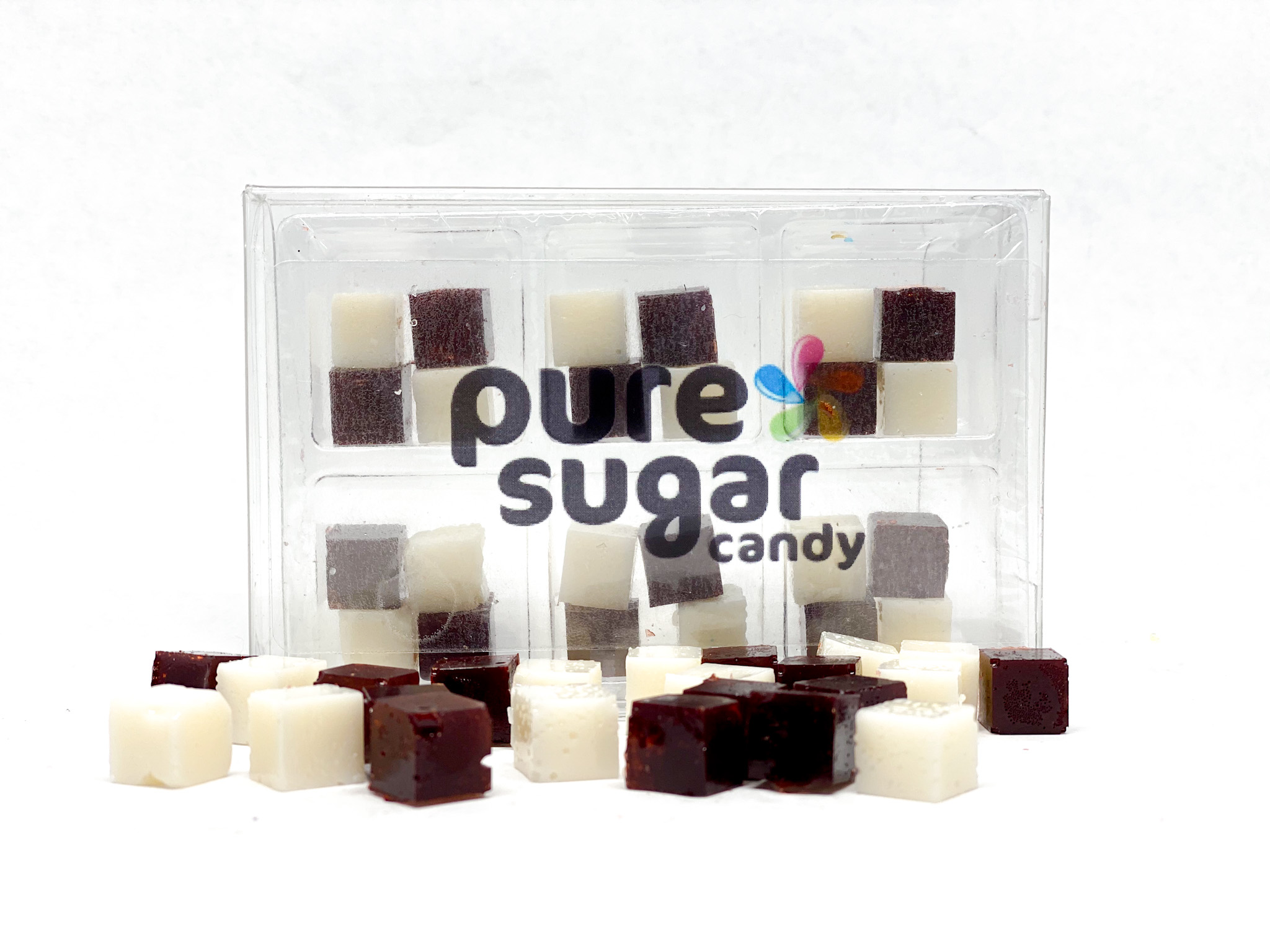 A tray of colorful Root Beer Float Candy Cubes, showcasing their unique cube shape and vibrant colors.