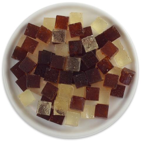 A tray of colorful Root Beer Float Candy Cubes, showcasing their unique cube shape and vibrant colors.