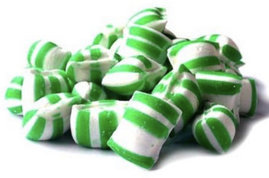 A tray of Candy Cubes - Spearmint featuring vibrant green cubes with a refreshing mint flavor.