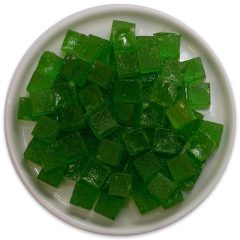 A tray of Candy Cubes - Spearmint featuring vibrant green cubes with a refreshing mint flavor.