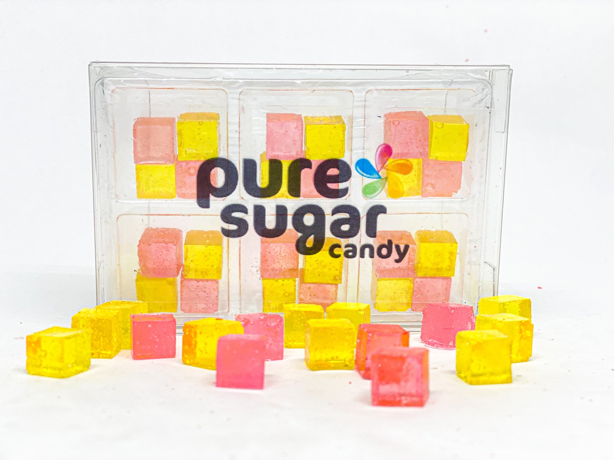 A vibrant tray of Candy Cubes in Watermelon Lemonade flavor, showcasing colorful cubes with a refreshing look.