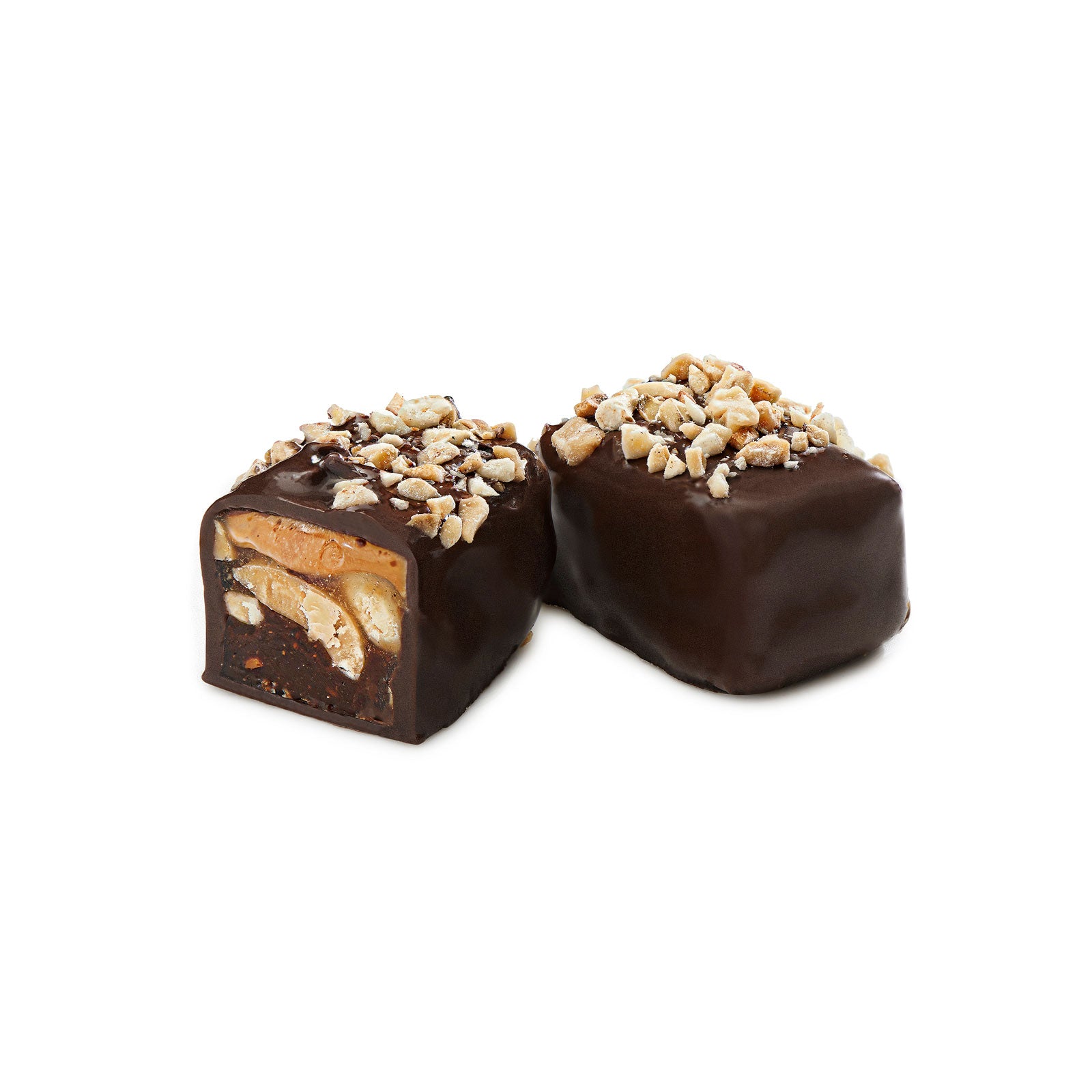 A close-up of Caramel Chew Nuts featuring a crunchy caramel exterior, salty nuts, and a rich dark chocolate coating.