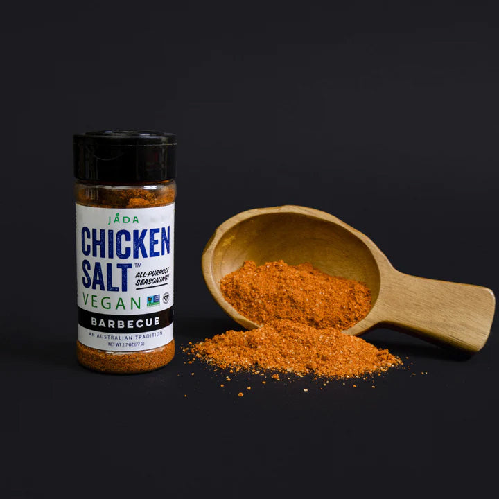 A jar of Chicken Salt Barbecue Flavor seasoning with a smoky and sweet blend, perfect for vegan cooking.