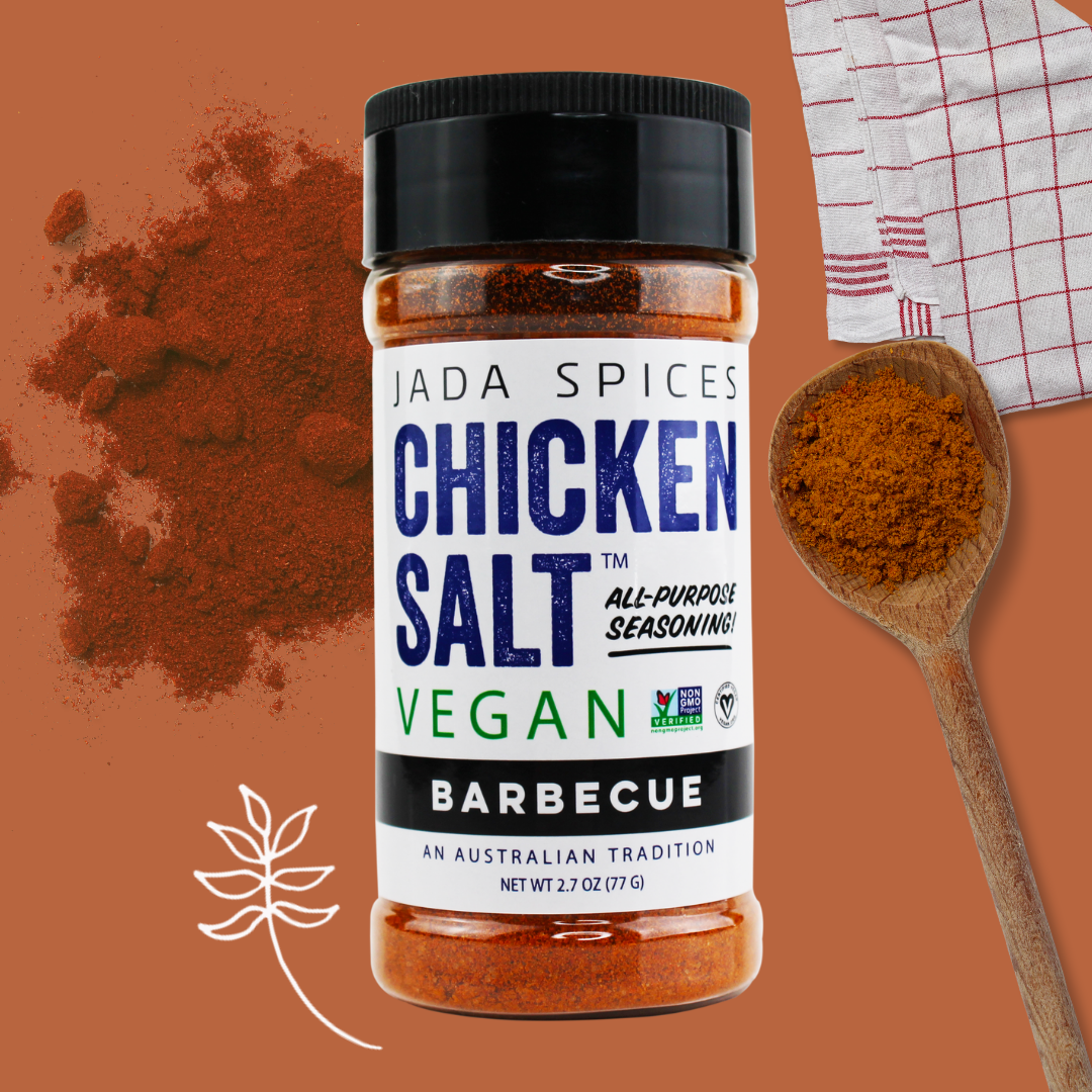 A jar of Chicken Salt Barbecue Flavor seasoning with a smoky and sweet blend, perfect for vegan cooking.