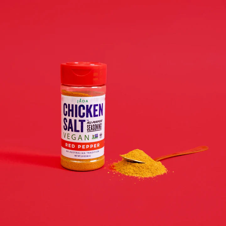 A jar of Chicken Salt Red Pepper Flavor seasoning with a vibrant label showcasing its spicy ingredients.