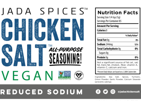 A jar of Chicken Salt Reduced Sodium Flavor seasoning with a vibrant label, showcasing its vegan and reduced sodium benefits.