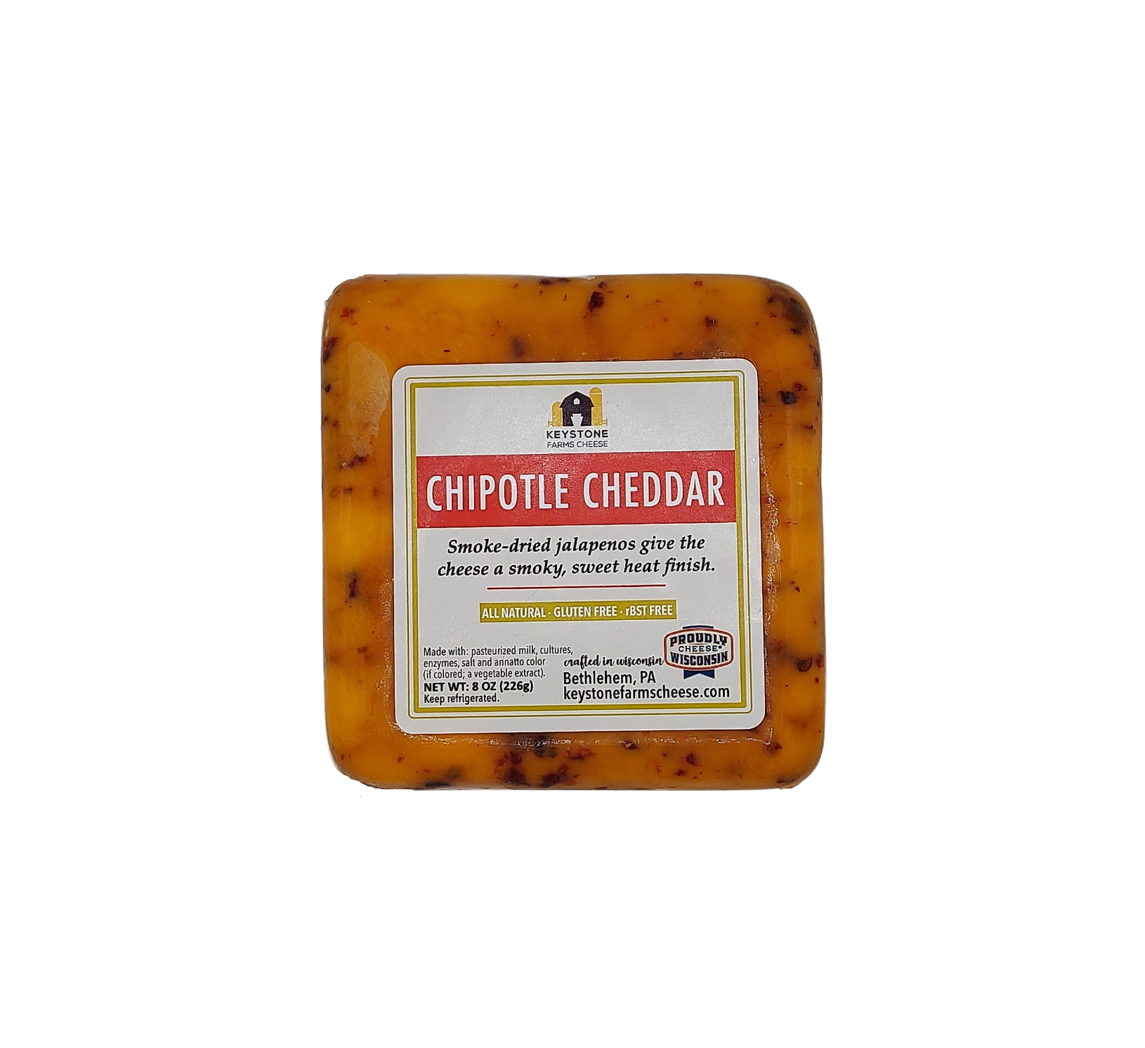 A block of Chipotle Cheddar cheese showcasing its rich, creamy texture with a hint of smoky chipotle flavor.