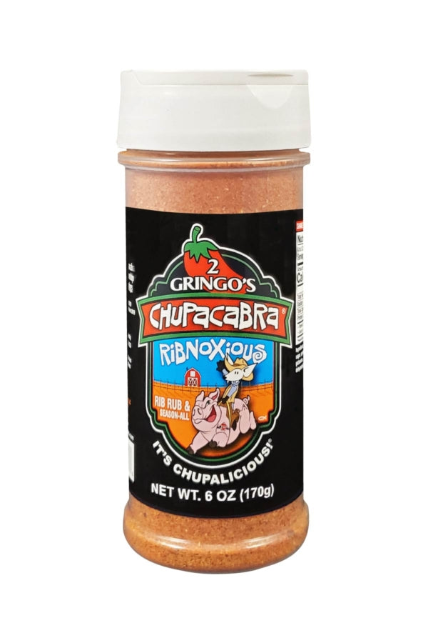 Chupacabra Ribnoxious 12 Oz seasoning rub bottle with a vibrant label showcasing its sweet and spicy flavor profile.